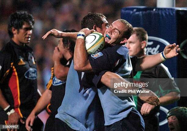 HAMILTON, NEW ZEALAND - APRIL 30:  Bulls Ettienne Botha celebrates his try against the Chiefs in their Super 12 rugby match played at Waikato Stadium in Hamilton, New Zealand, Friday, April 30th, 2004.  (Photo by Phil Walter/Getty Images)